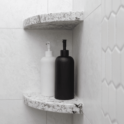 Custom tile work, including a shower soap niche is an impactful way to create additional design interest in your bathroom renovation