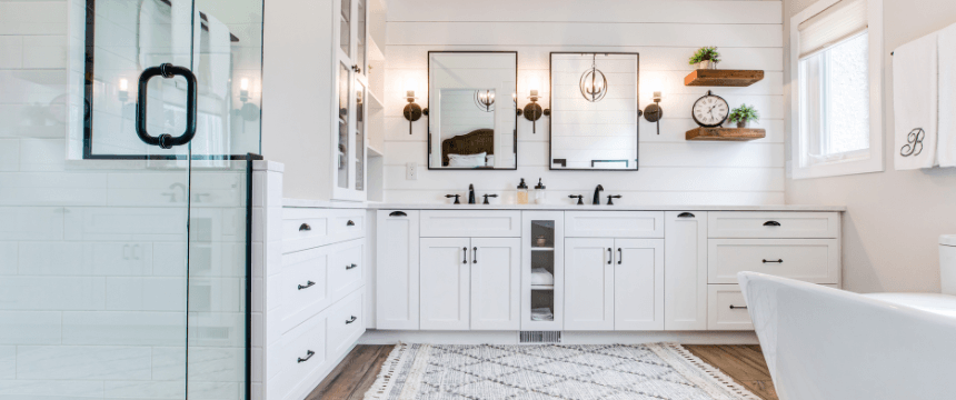 Modern ensuite bathroom with dual sinks.